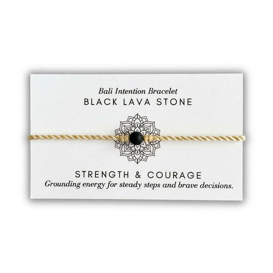 Black Lava Stone Bali Intention Bracelet displayed on its meaning card with strength and courage message