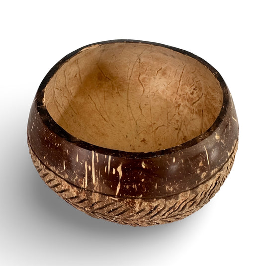 Hand-carved coconut shell bowl with island lines pattern, top view