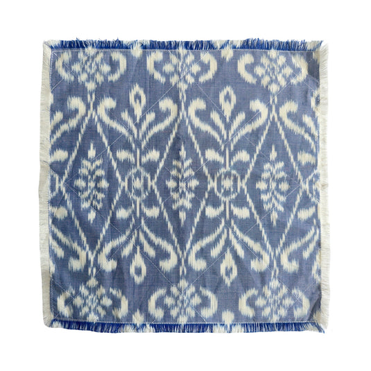 Handwoven endek table napkin in soft indigo with ikat pattern