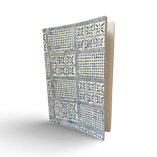 Plantable batik notebook with handmade patterned cover, partially open