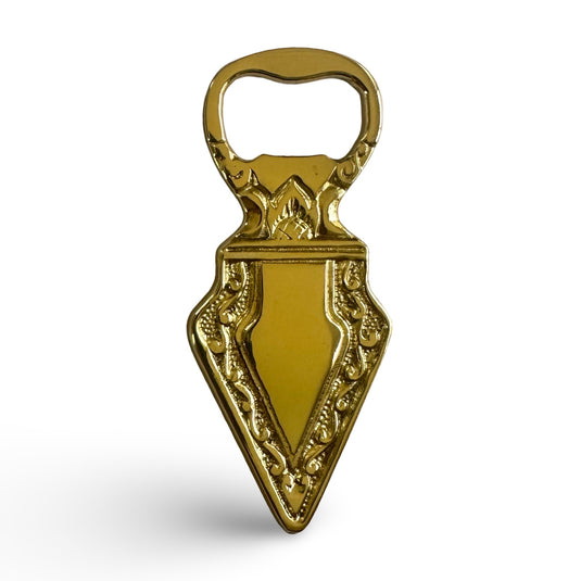 Wayang brass bottle opener with decorative carved handle