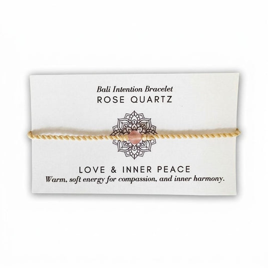 Rose Quartz Bali Intention Bracelet displayed on its meaning card with love and inner peace message