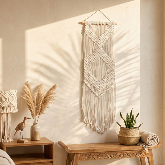 Macramé wall hanging styled in natural boho interior setting