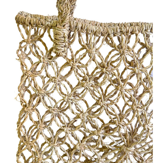 Close-up of hand-knotted natural rope tote bag weave