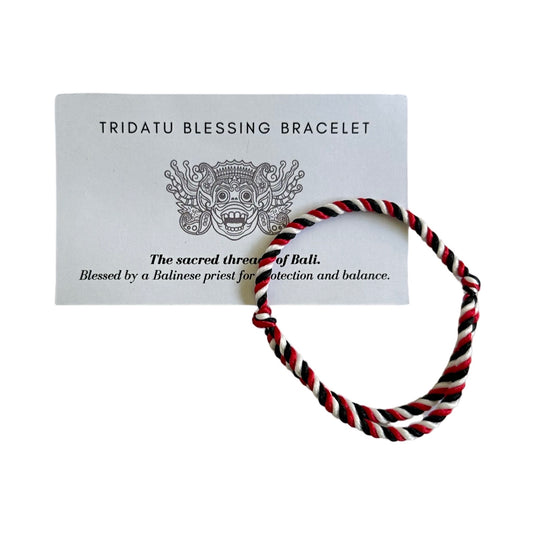 Tridatu Blessing Bracelet with Balinese story card in woven palm leaf holder